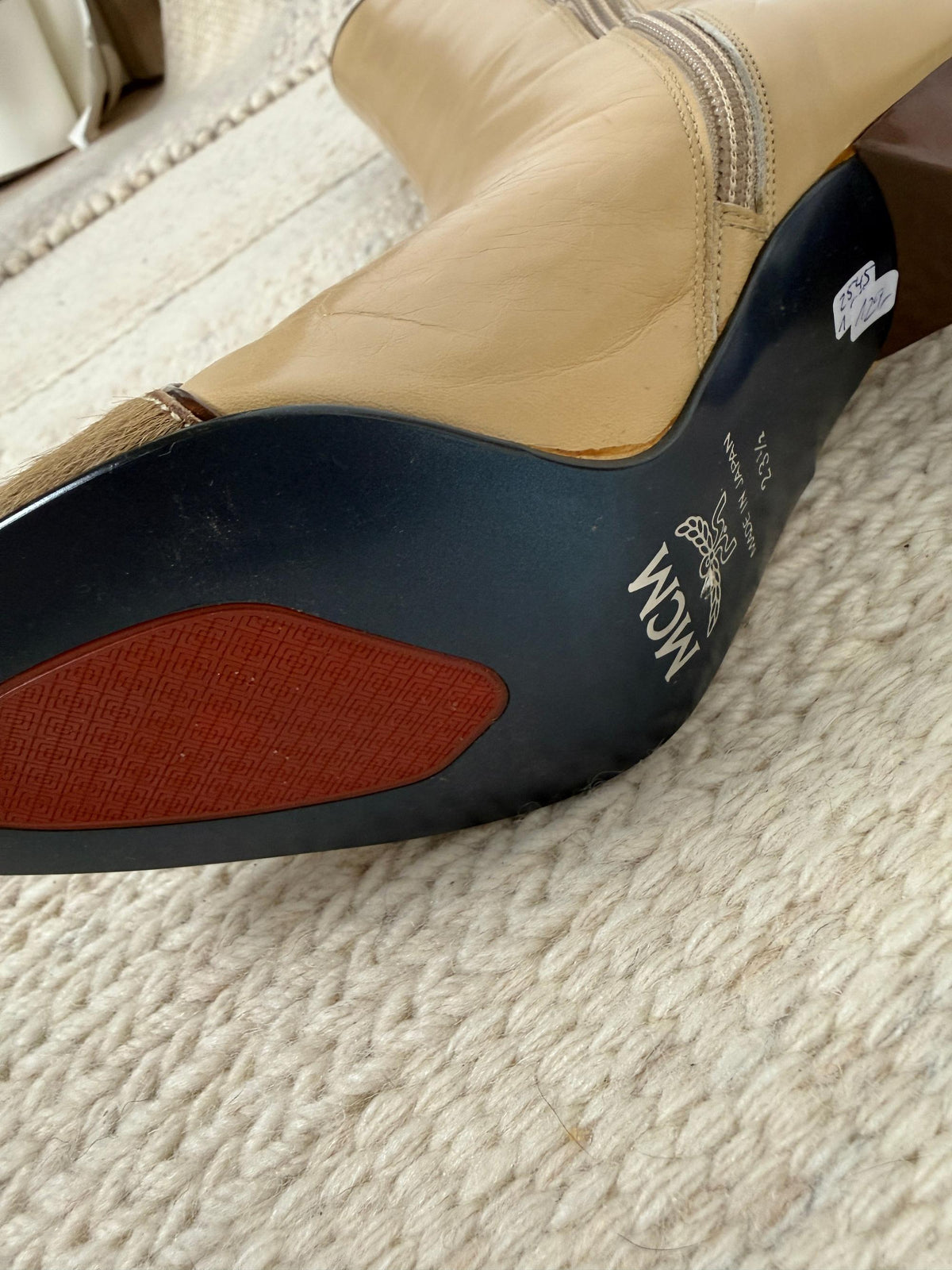 Hohe Stiefel aus Glattleder mit Felldetail-MCM-Dear Berlin